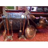 A collection of fireside metal wares comprising a good quality copper helmet coal scuttle together