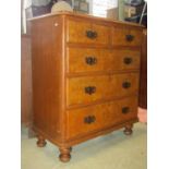 A Victorian pine chest of three long and two short drawers with original simulated maple grained