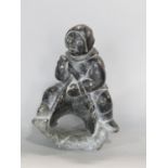 Carved Inuit stone figure of a tribesman, 16cm high