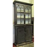 A small 19th century stained pine cottage dresser, the lower section enclosed by a pair of