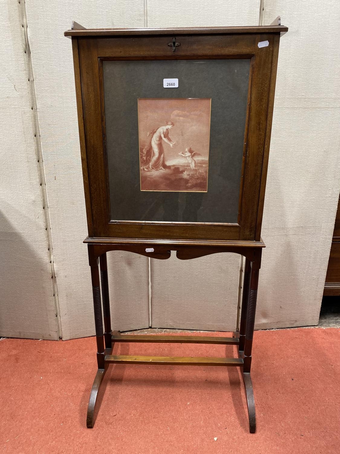 An Edwardian mahogany inlaid writing desk or folio stand, the fall flap revealing a fitted
