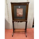 An Edwardian mahogany inlaid writing desk or folio stand, the fall flap revealing a fitted