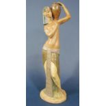 A large and unusual Lladro matt glazed figure of an Egyptian style male water carrier, 56.5 cm