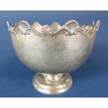 Edwardian silver pedestal fruit bowl with raised wavy scallop shell rim and stepped circular base,