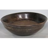 Antique turned treen bowl with banded decoration and good patina, 29cm diameter