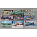9 model aircraft kits of WW2 fighter planes, all un-started, most with sealed box or sealed