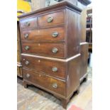A small Georgian mahogany chest on chest of four long and two short graduated drawers, on bracket