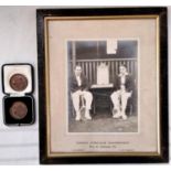 A pair of Suffolk Lawn Tennis Association medals dated 1929 and 1931 (displayed in cabinet) together