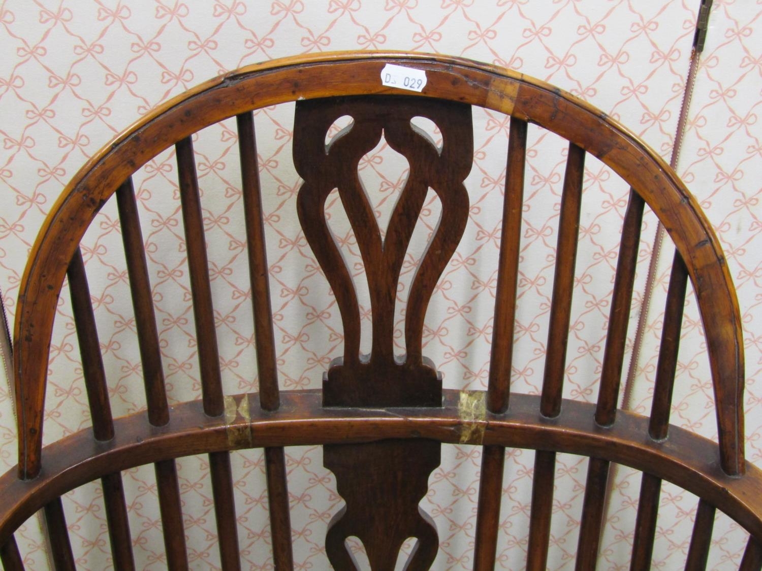 A Georgian Windsor gun back elbow chair in mixed woods, principally elm, fruit wood and yew wood, - Image 3 of 3