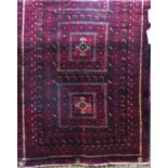 Good quality Turkoman rug with three square medallions and further geometric still lives, upon a