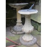 A reclaimed three sectional bird bath of circular form, the top 40 cm in diameter x 60 cm high,