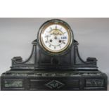 A good quality late 19th century black slate architectural mantel clock, with enamelled dial, twin
