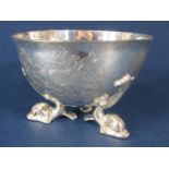 Unusual silver bowl, engraved with a crest of a knight, a rampant lion and shield, upon three cast