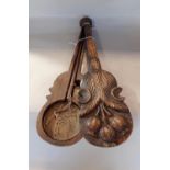 Interesting treen cased set of opium scales, the case carved with a floral bouquet, 57cm long
