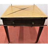 An Edwardian mahogany envelope card table, raised on square tapered supports, (reduced in height)