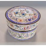 An Indian enamelled circular box and cover, with repeating floral bands, to the lid a further floral