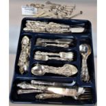 A large collection of silver plated fancy handled cutlery, together with a further large
