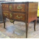 A Louis XV kingwood commode, the serpentine front fitted with one long and two short drawers
