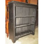 A Victorian oak open bookcase with repeating geometric decoration, 88cm wide (lacks one length of