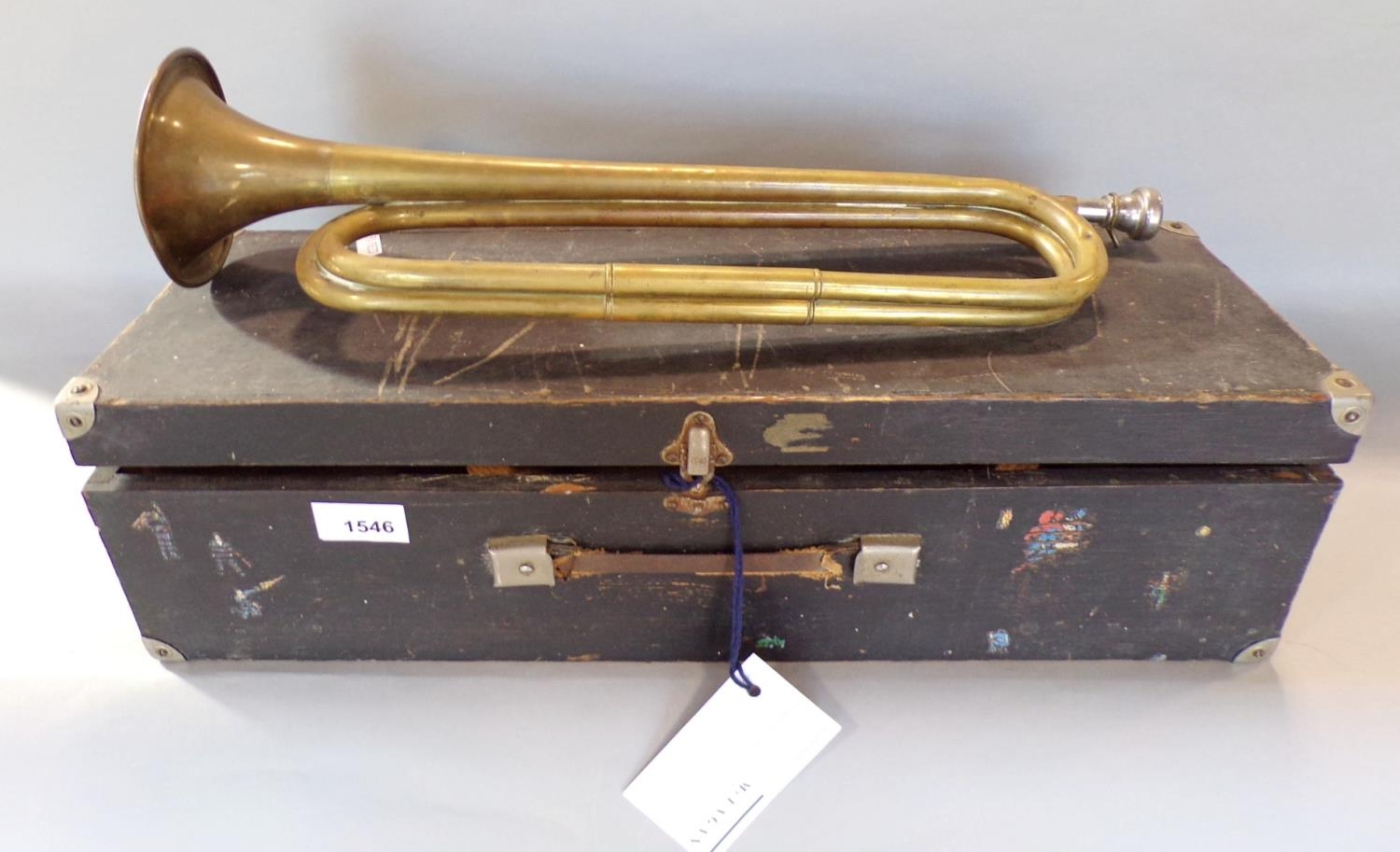 Cased B.B.I.M. Ltd brass horn, 48cm long within a wooden case