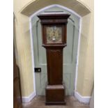 Mid-18th century oak longcase clock, the trunk with canted corners, the hood with column supports
