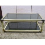 A contemporary two tier coated metal framed two tier occasional table of rectangular form, loosely