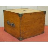A 19th century oak travelling box with rising lid, revealing a segmented interior, with brass banded