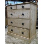 A Victorian stripped and waxed pine chest of three long and two short drawers, 105cm wide x 115cm
