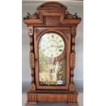 Vintage German gingerbread clock, with typical painted steel dial, three train movement and