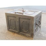 A 19th century cast iron strong box with panelled frame, drop carrying handles, lock and key, 46