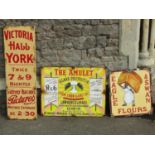 Four retro painted signs for Eagle and Sawn Flowers, The Amulet Glare Protector and Victoria Hall at