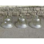 Three moulded glass bell shaped garden cloches, the rim 33 cm in diameter