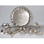 A large collection of mainly silver plated old English ladles, together with various berry spoons