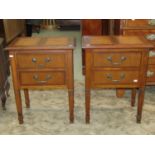 A pair of contemporary bedside or drawing room tables, each fitted with two frieze drawers on square