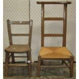 A child's chair in ash wood, together with a further ladder back prei deui with rush seat