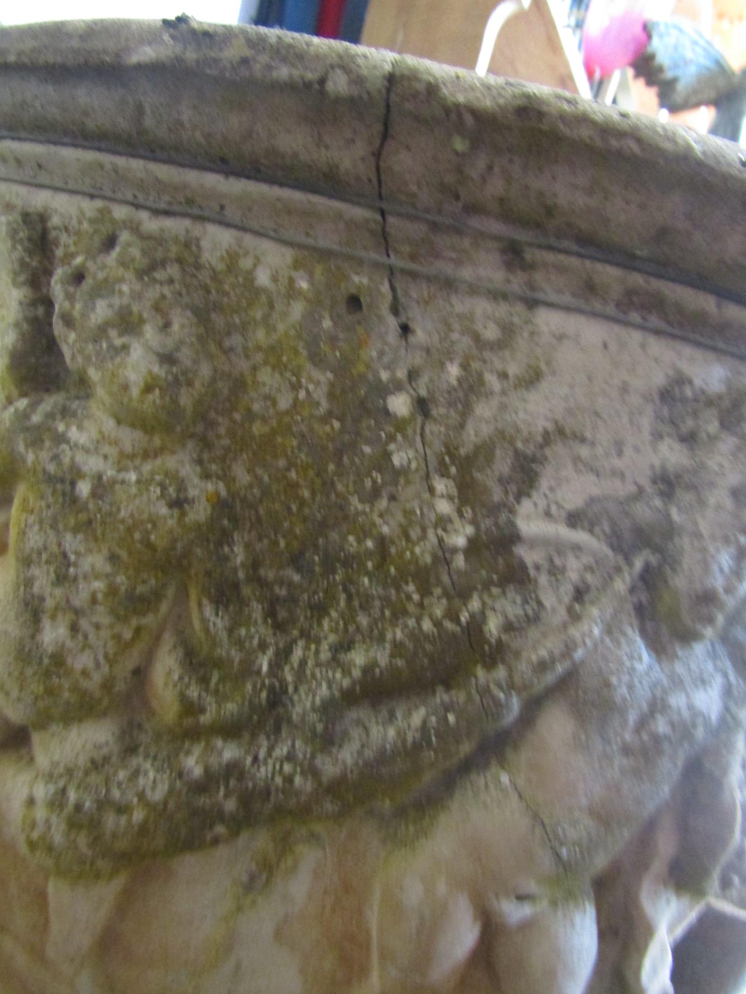 A reclaimed garden urn of circular form with raised repeating cherub and swag detail raised on a - Image 4 of 4