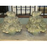 A pair of small reclaimed finials in the form of baskets of fruit, 40 cm high approximately