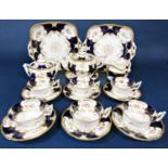 A collection of Coalport Batwing teawares in the blue colourway comprising teapot, sugar bowl,