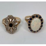 Two 9ct sapphire dress rings; an Art Deco style example, size P/Q and a cabochon opal example,