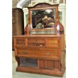 A good quality late Victorian walnut dressing chest, the raised back incorporating a rectangular
