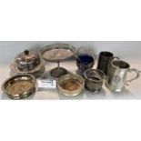 A collection of silver plated items to include various wine coasters, muffin dishes, salvers, etc