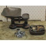 A set of Victorian ironwork kitchen balance scales to weigh 7lbs, together with a collection of