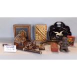 Two boxes containing a large collection of eastern souvenirs and artefacts,