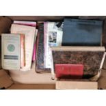 A box containing a mixed collection of ephemera to include a stamp album, photograph albums, maps,