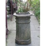 A reclaimed Victorian buff coloured chimney pot of unusual octagonal form stamped Farnley & Co (