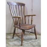 19th century Windsor lathe back elbow chair in elm and beech