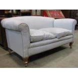 A good quality drop end two seater settee, on shaped supports with recent upholstery, 170cm
