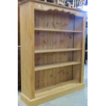 A contemporary light pine open bookcase in the traditional style, 115cm wide x 138cm high