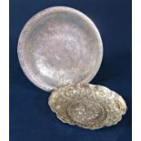 Eastern white metal dish engraved with Islamic panels and calligraphy, 17cm diameter, together