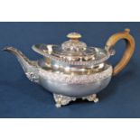 Good quality Georgian squat baluster circular teapot, with band of flowerhead roundels and further